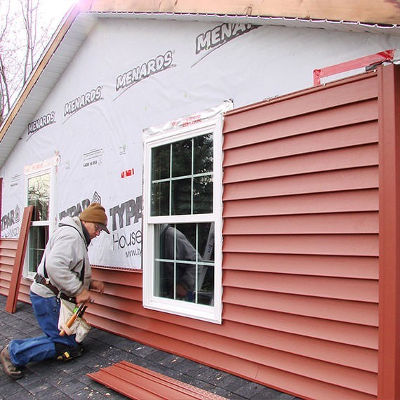 Обшивка дома сайдингом в Островном и Мурманской области